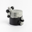 buttercream cake - concrete sphere with black base