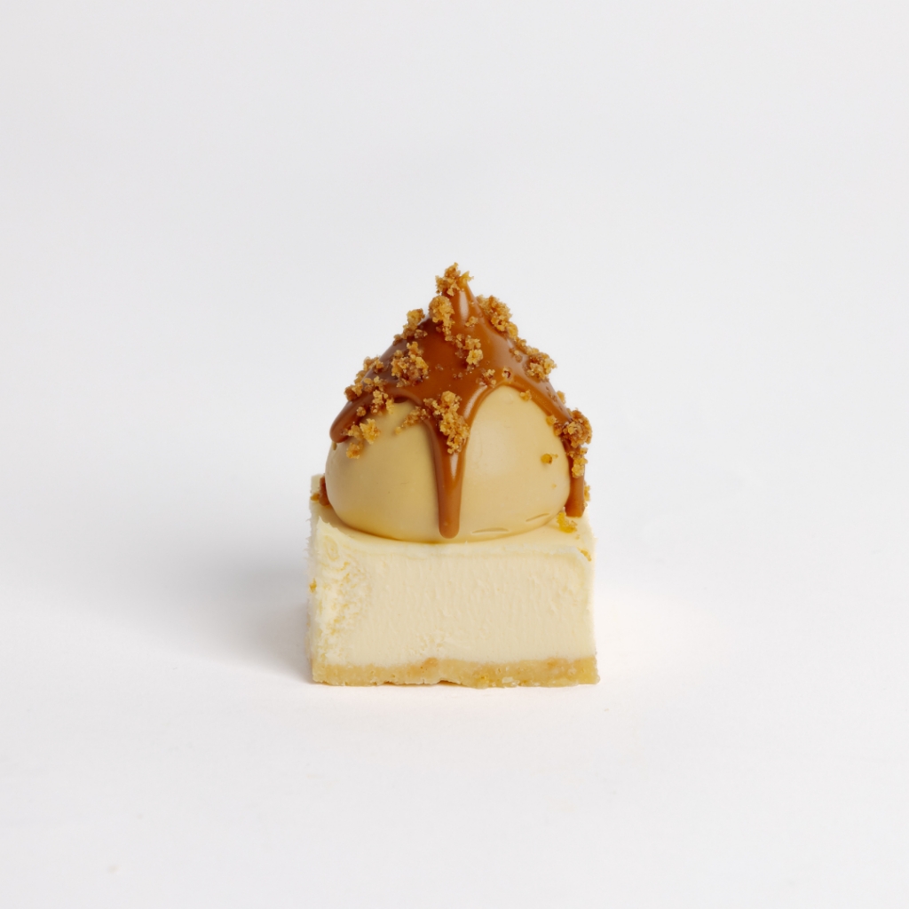 Mini Biscoff Cheesecake generously topped with a swirl of smooth biscoff spread and crumbled biscuits