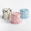 Three Buttercream Bow Cakes in white with black bows, pink with pink bows, and blue with blue bows, featuring cascading ribbons.