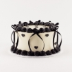 Mini Hearts Buttercream Cake with creamy white frosting and black heart decorations with bow