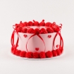 Mini Hearts Buttercream Cake with pink frosting and red heart decorations with bow