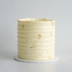 LaManna Creamy White Rough Lines Buttercream Cake with Gold Leaf